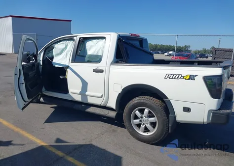 2014 Nissan Titan Pro-4X z USA, uszkodzony, nr VIN 1N6BA0EC3EN504087